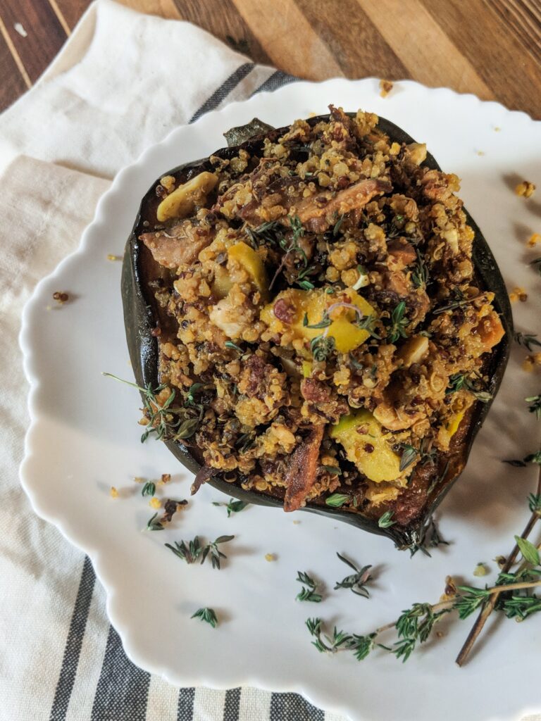 overhead image of stuffed acorn squash on a plate