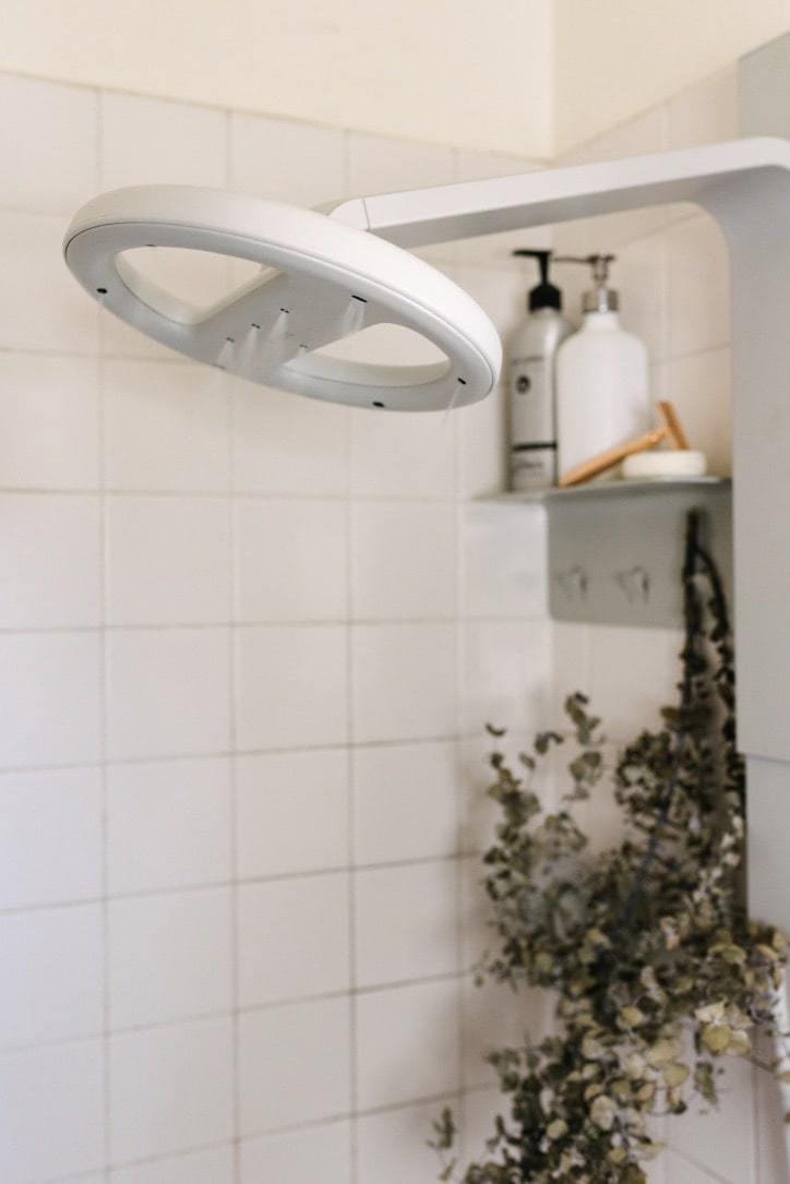 Nebia showerhead: 6 Ways to Save Money on Your Electric Bill in the Bathroom from www.goingzerowaste.com #zerowaste #savemoney #electricbill #electricity #frugal #frugalliving #sustainableliving 