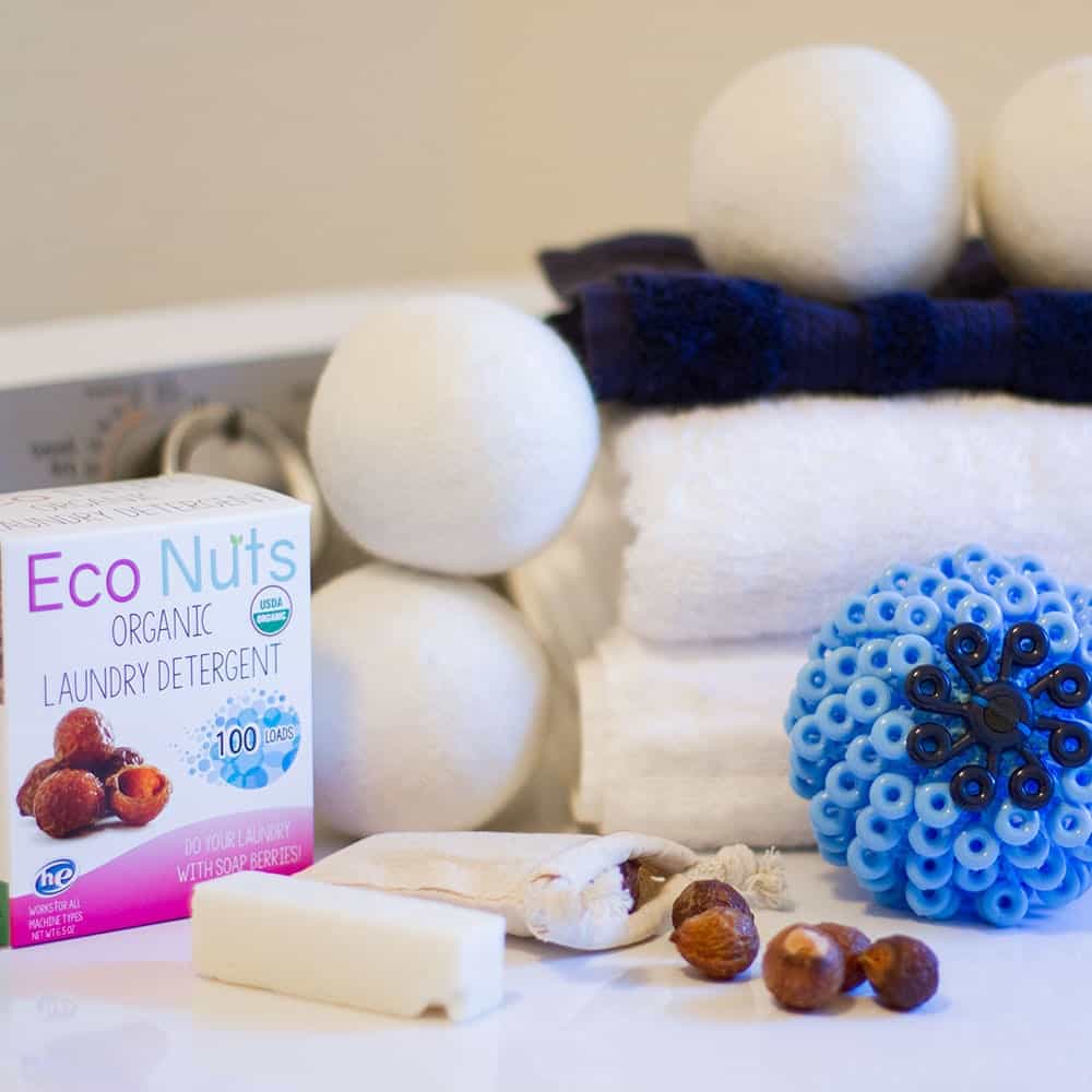 earth hero laundry basket including a cora ball, soapnuts, towels, and wool dryer balls  | organic, all natural, eco friendly 