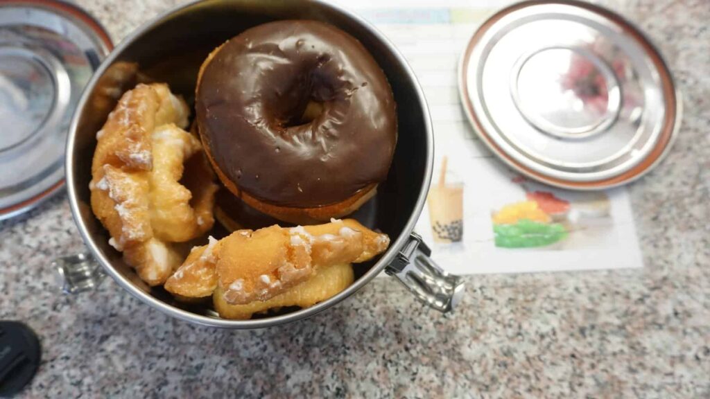 donuts in a stainless steel tiffin